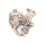 Georg Jensen- A brooch cast with a lamb and frond of ivy foliage, designed by Arno Malinowski,
