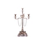 A silver plated four light, three branch table centrepiece; with central Corinthian column, three