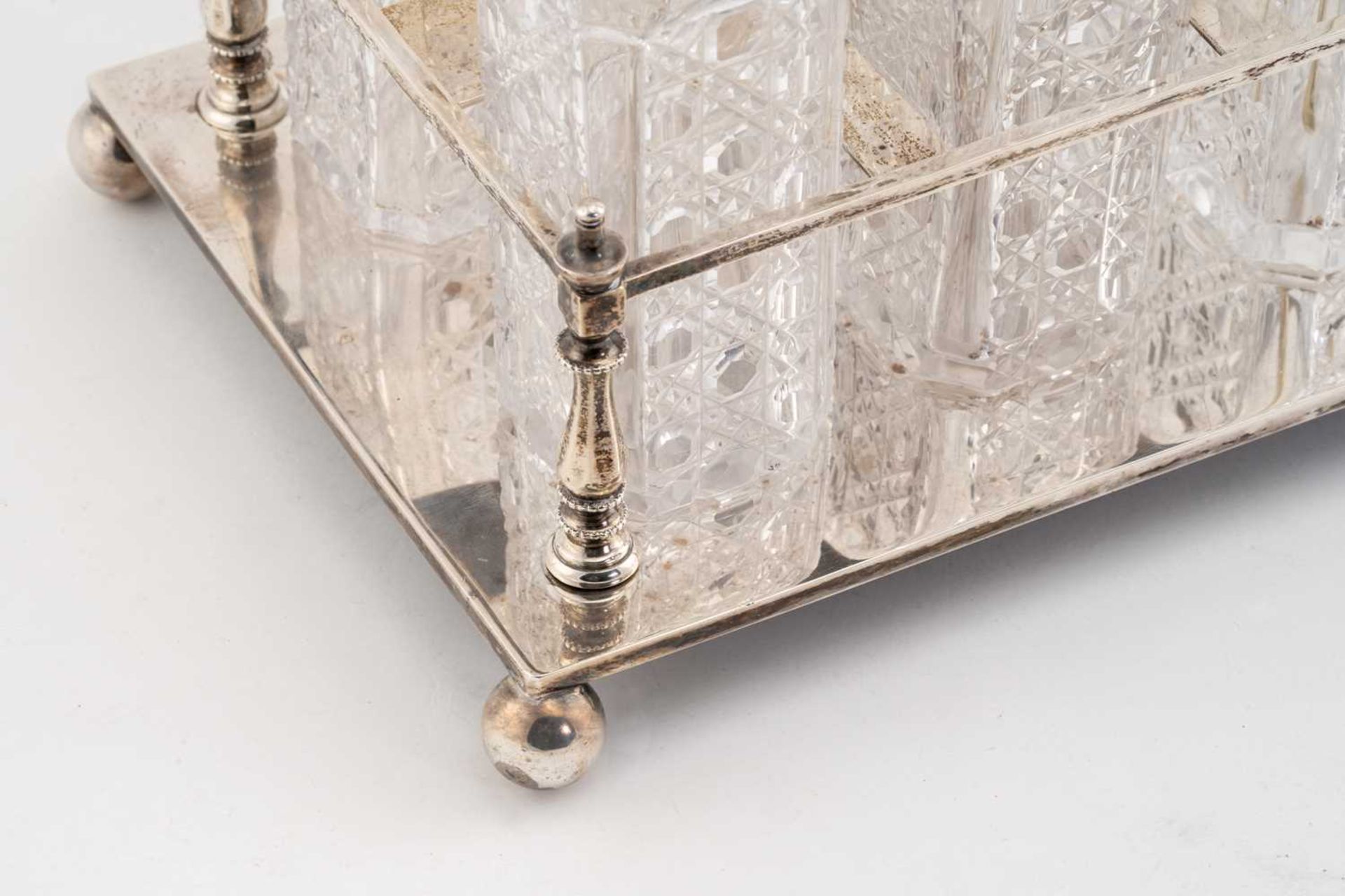 A late Victorian silver six-bottle cruet stand, Sheffield 1893 by Mappin and Webb, of rectangular - Image 5 of 7