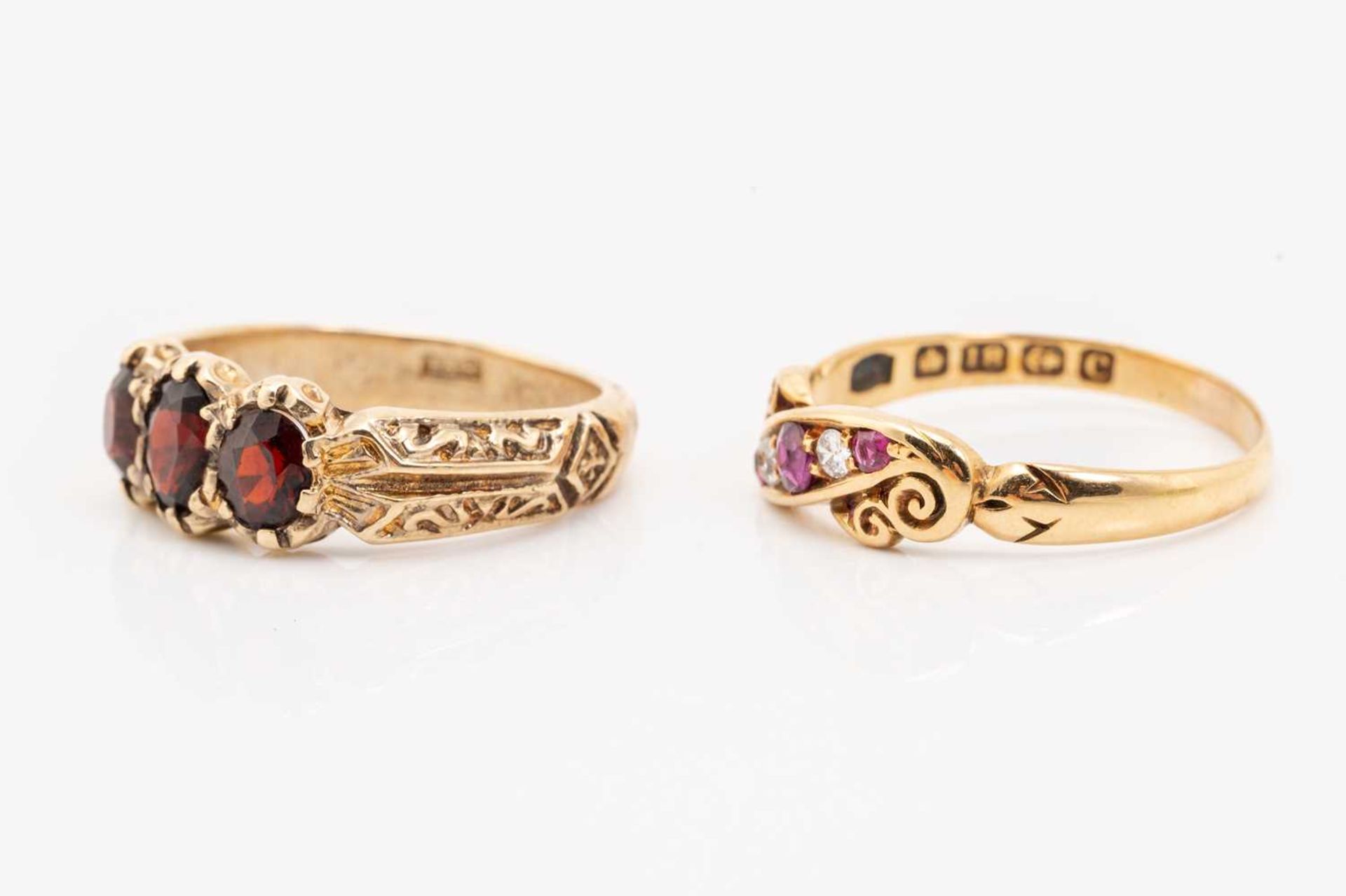 An Edwardian ruby and diamond ring, together with a three-stone garnet ring; the first consists of - Image 3 of 6