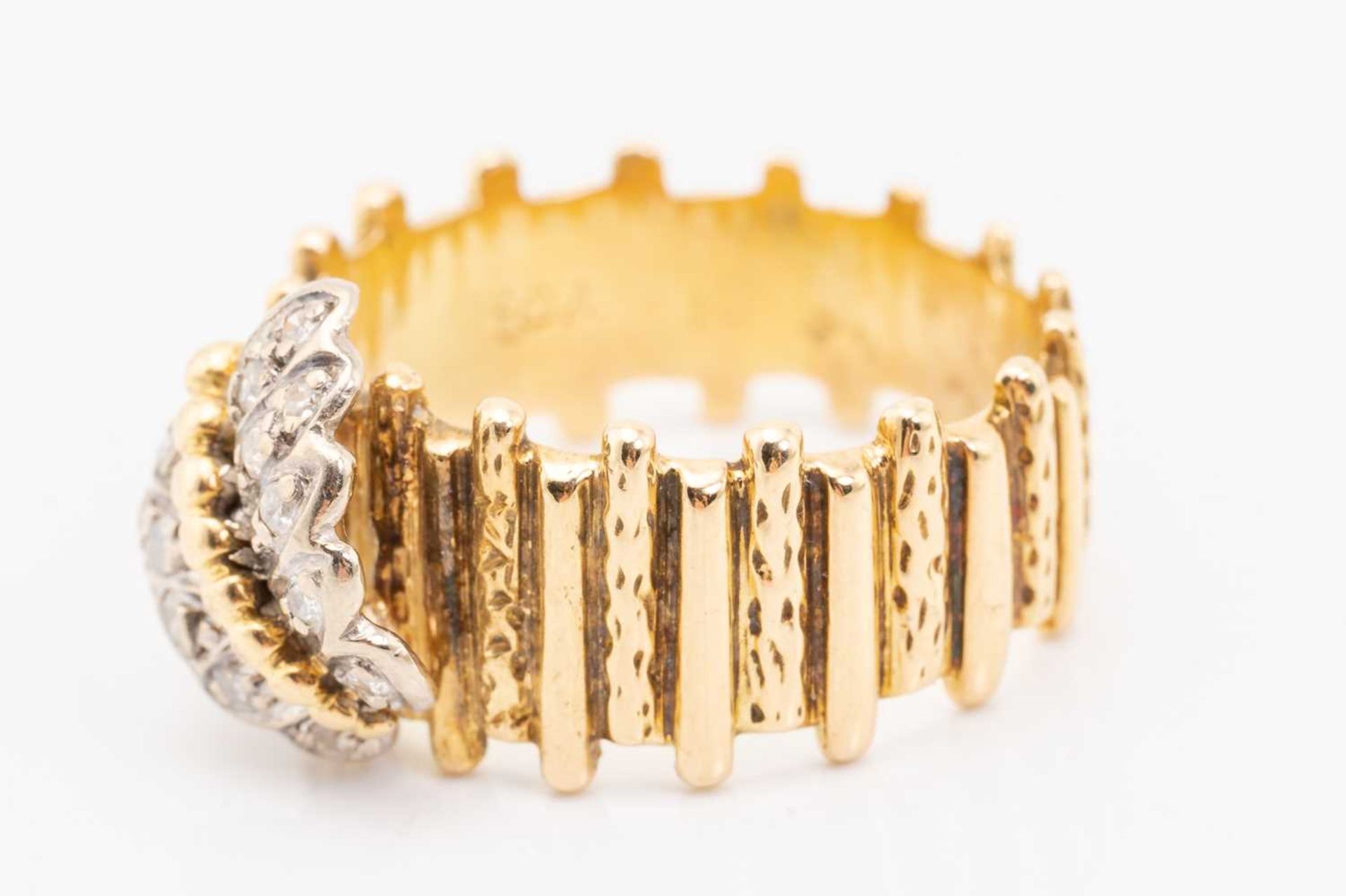 A yellow metal and diamond ring, designed with a diamond-set butterfly, with textured band, unmarked - Image 3 of 5