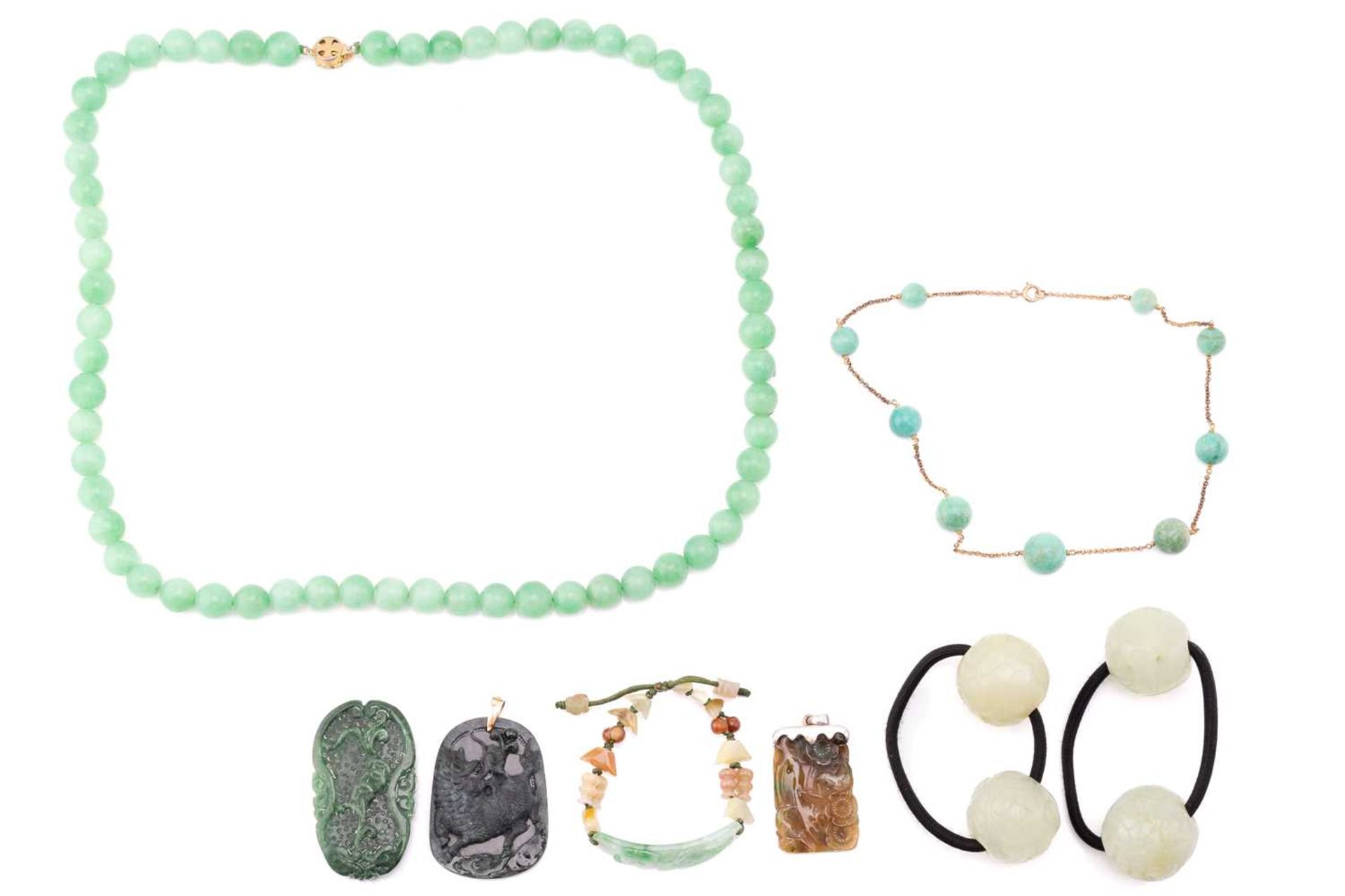 A collection of Chinese jewellery; including a jade ID bracelet, curved carved panel with auspicious