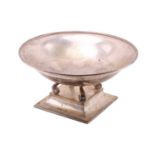 A Theo Fennell heavy silver circular comport/ table centre, London 2000 by Theo Fennell, with a deep