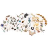 A mixed collection of thirty eight pendants, including tiger's eye pendant in 9ct, a lapis lazuli