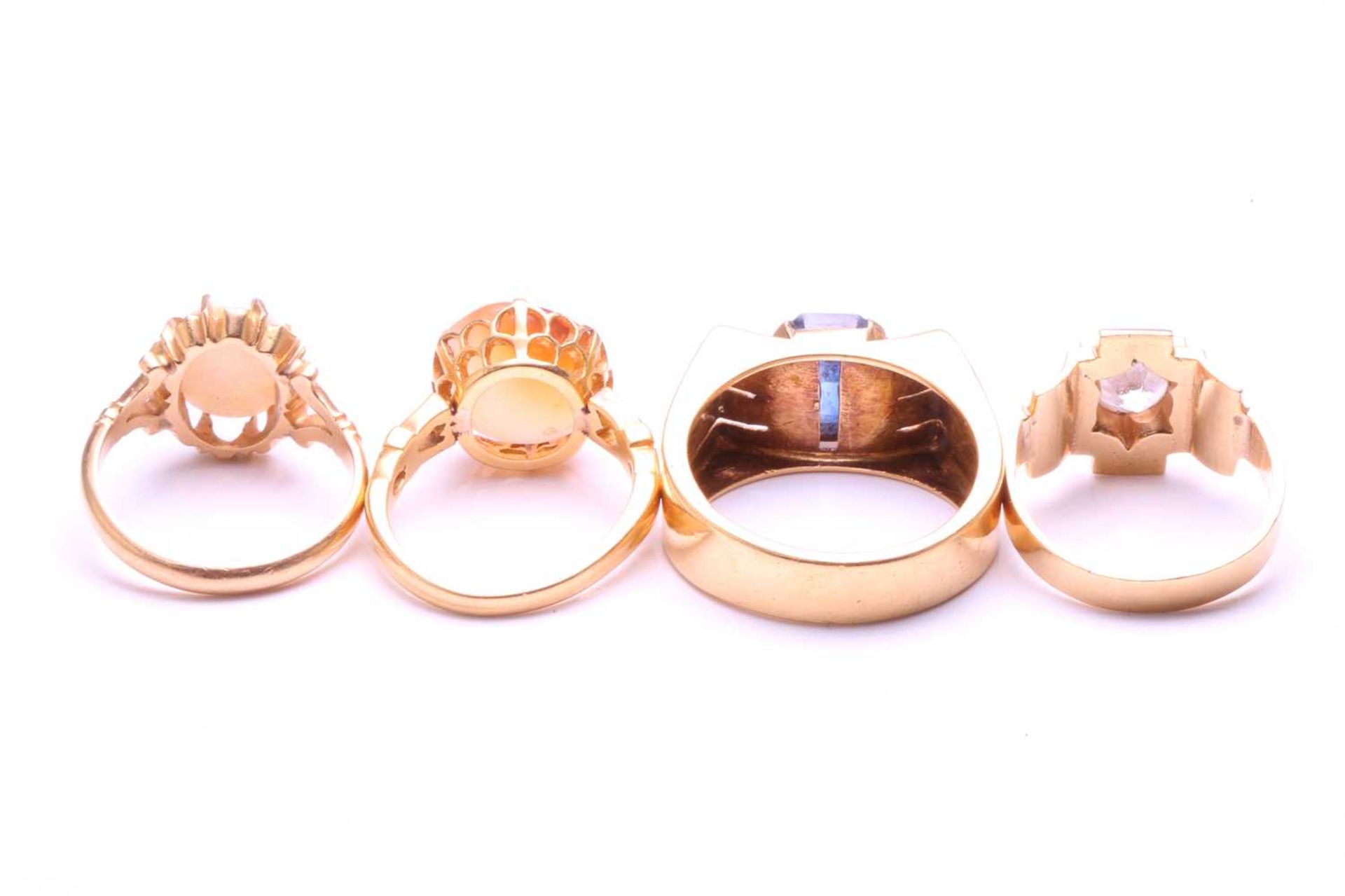 Four gem-set rings, including an Aqeeq ring with a round carnelian in coronet setting, engraved with - Image 4 of 4