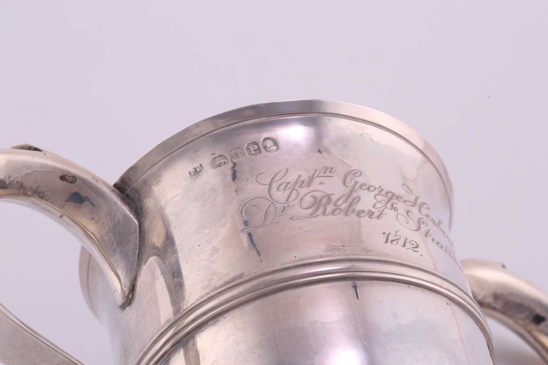 A George III two handled cup; inverted bell shape with hollow side handles and central reeded - Image 5 of 5