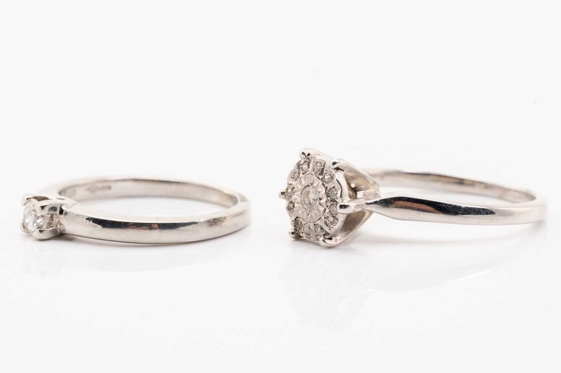 A single stone diamond ring and a diamond cluster ring, featuring a claw set round brilliant cut - Image 2 of 6