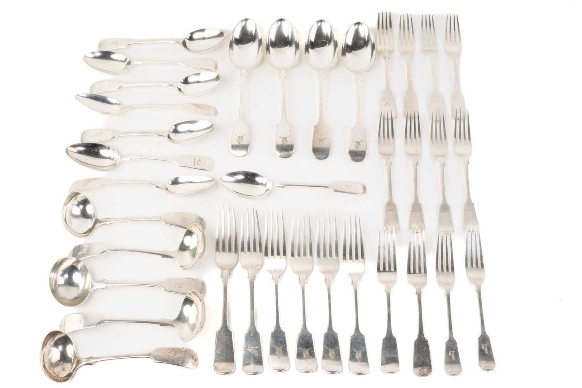 A part canteen of silver fiddle pattern flatware, some with crests engraved to terminals. Mixed