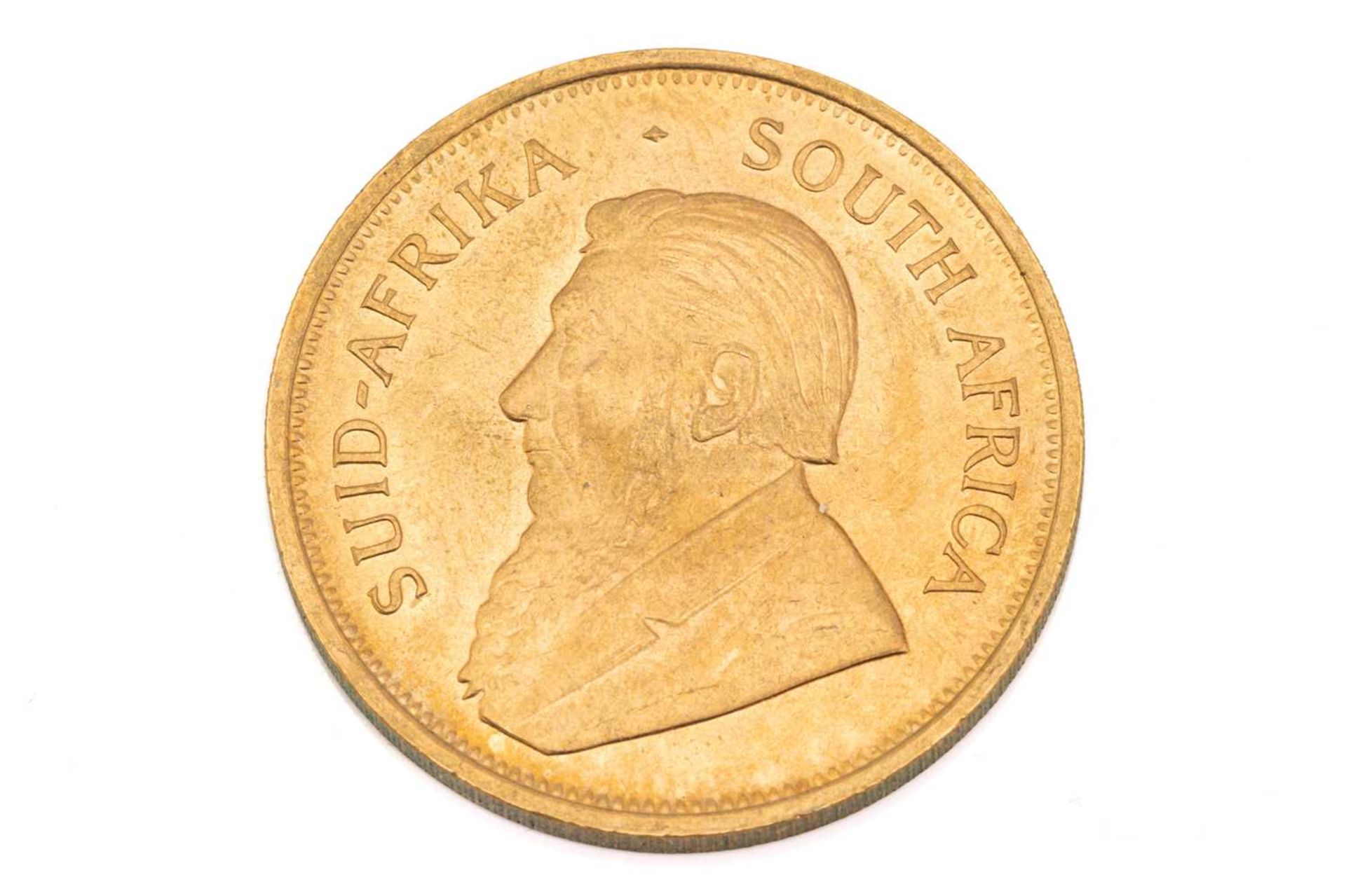 A 1oz 22ct gold South Africa Krugerrand, 1974Obv: very light, short surface marks. Rev: Very light - Image 2 of 3