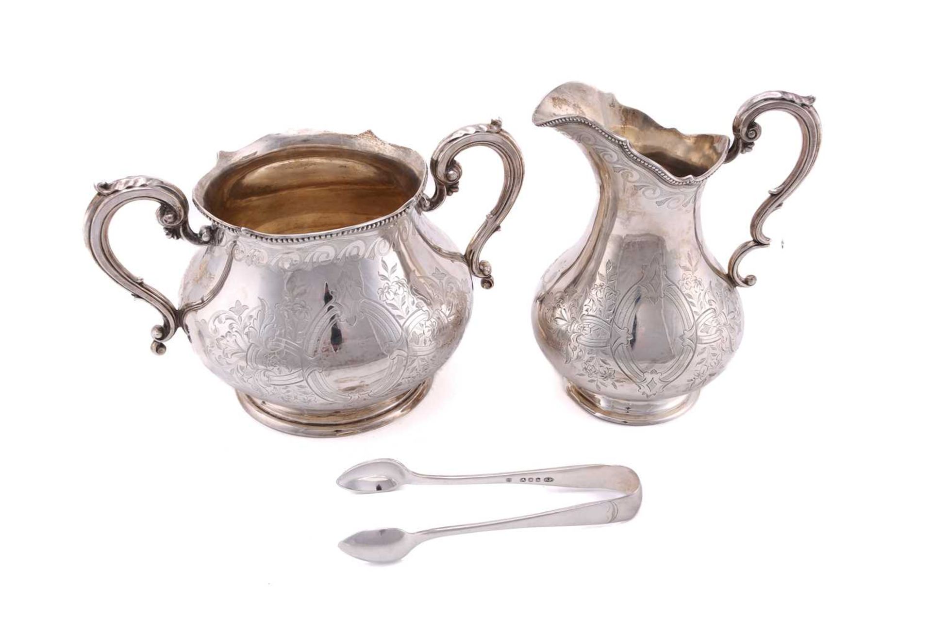 A Victorian silver three-piece tea service and sugar tongs of mixed date but the corresponding - Image 8 of 10