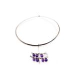Georg Jensen - 'Neck Ring' with quartz and amethyst multi-drop pendant; comprising a streamlined