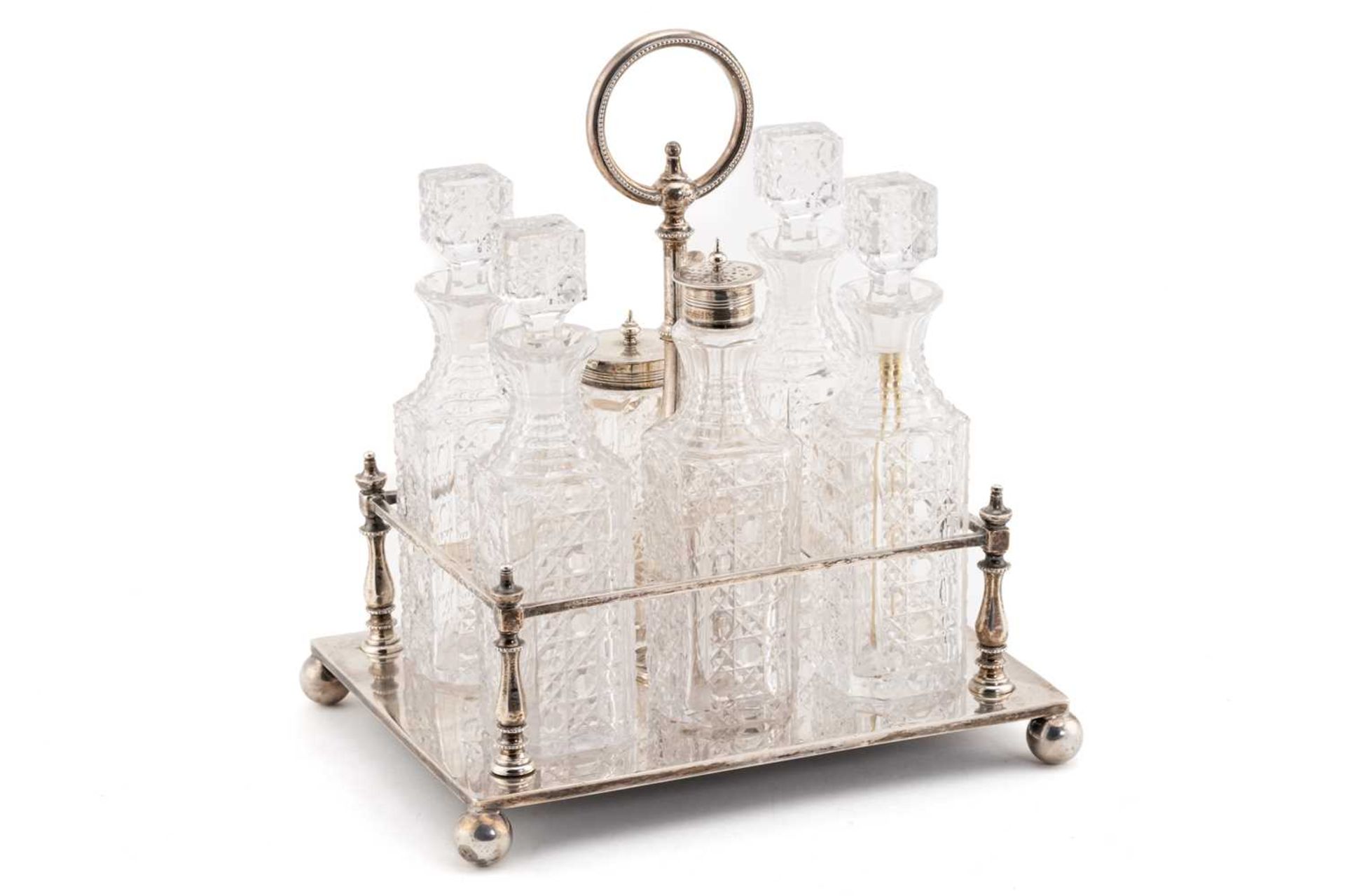 A late Victorian silver six-bottle cruet stand, Sheffield 1893 by Mappin and Webb, of rectangular