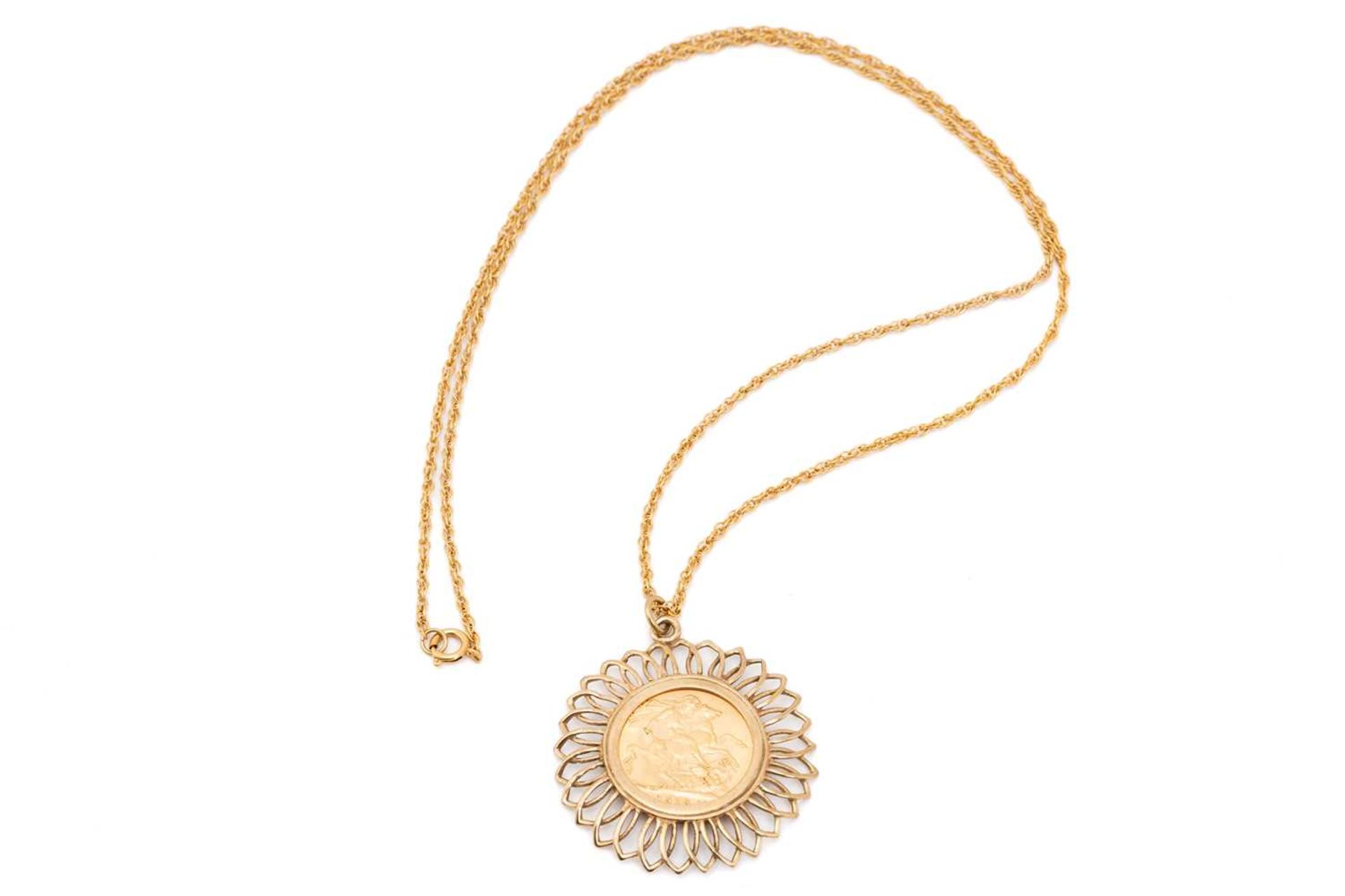 A sovereign pendant on chain; the sovereign dated 1913, in 9 carat gold openwork mount; to an