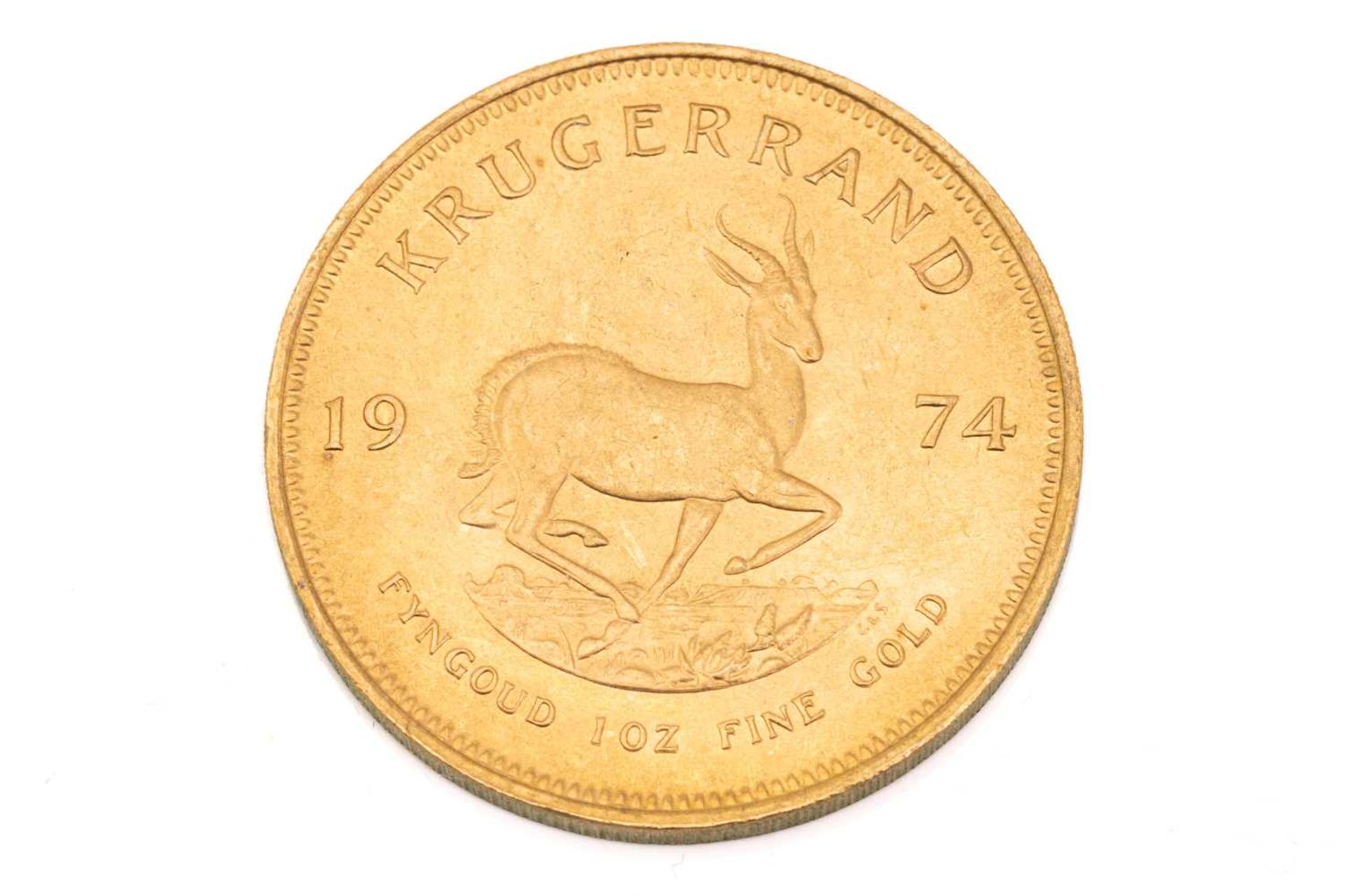A 1oz 22ct gold South Africa Krugerrand, 1974Very, very light surface marks to both sides. Almost - Image 3 of 3
