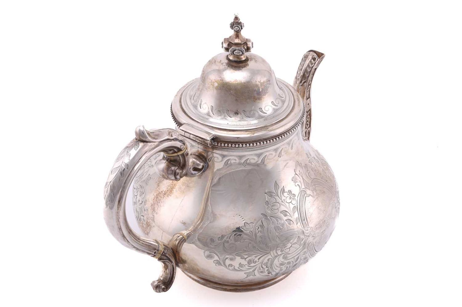 A Victorian silver three-piece tea service and sugar tongs of mixed date but the corresponding - Image 5 of 10