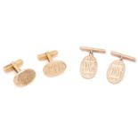 A pair of 9ct yellow gold cufflinks, the oval plaques with engraved monograms, bar links and