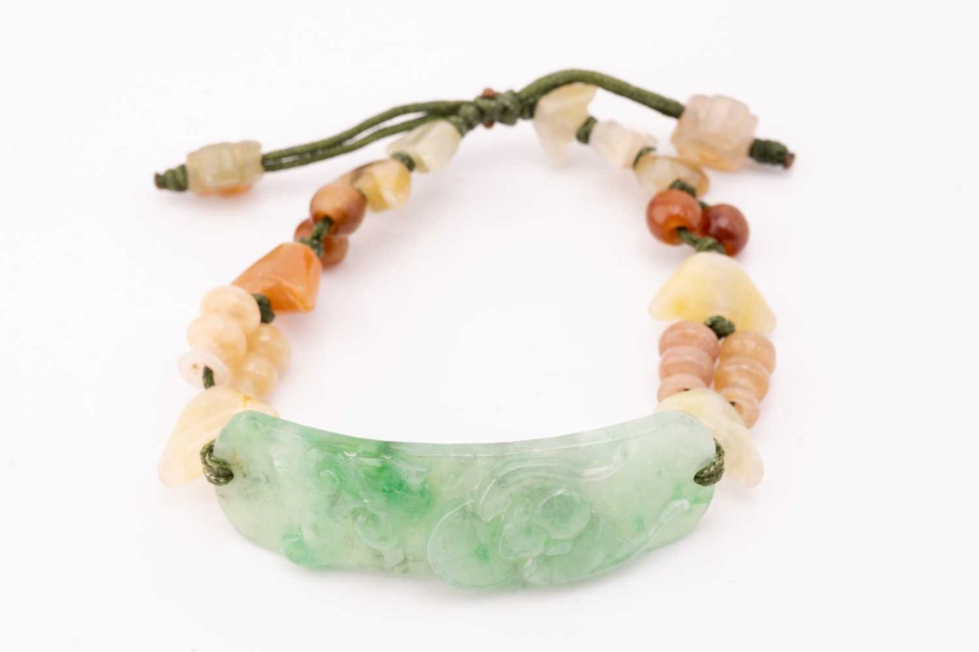 A collection of Chinese jewellery; including a jade ID bracelet, curved carved panel with auspicious - Image 10 of 19