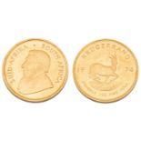 A 1oz 22ct gold South Africa Krugerrand, 1974Very light surface marks to both sides. Almost UNC.