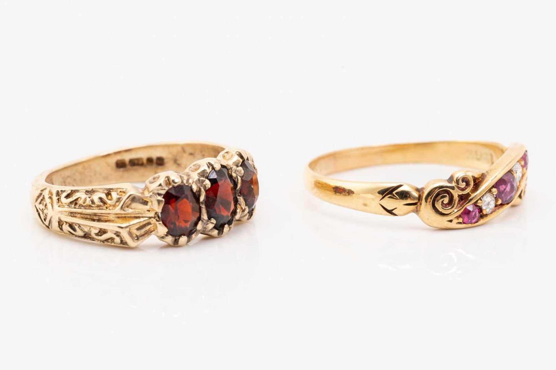 An Edwardian ruby and diamond ring, together with a three-stone garnet ring; the first consists of - Image 2 of 6