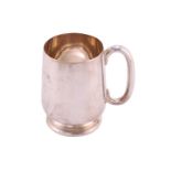 A silver pint tankard; tapering cylindrical with hollow 'C’ scroll handle and commemorative