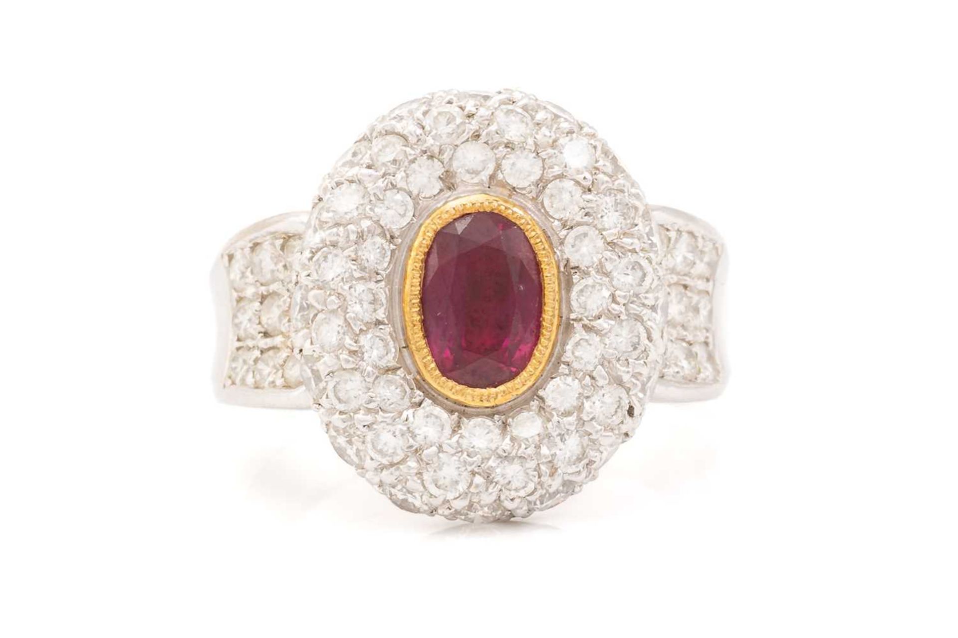 A synthetic ruby and diamond cluster style ring, featuring a rub over set oval cut synthetic ruby - Image 4 of 5
