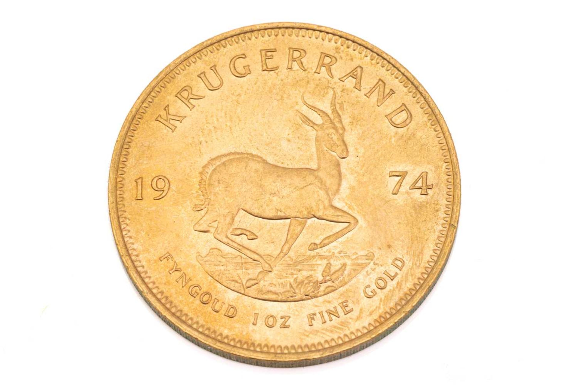 A 1oz 22ct gold South Africa Krugerrand, 1974Obv: very light, short surface marks. Rev: Very light - Image 3 of 3