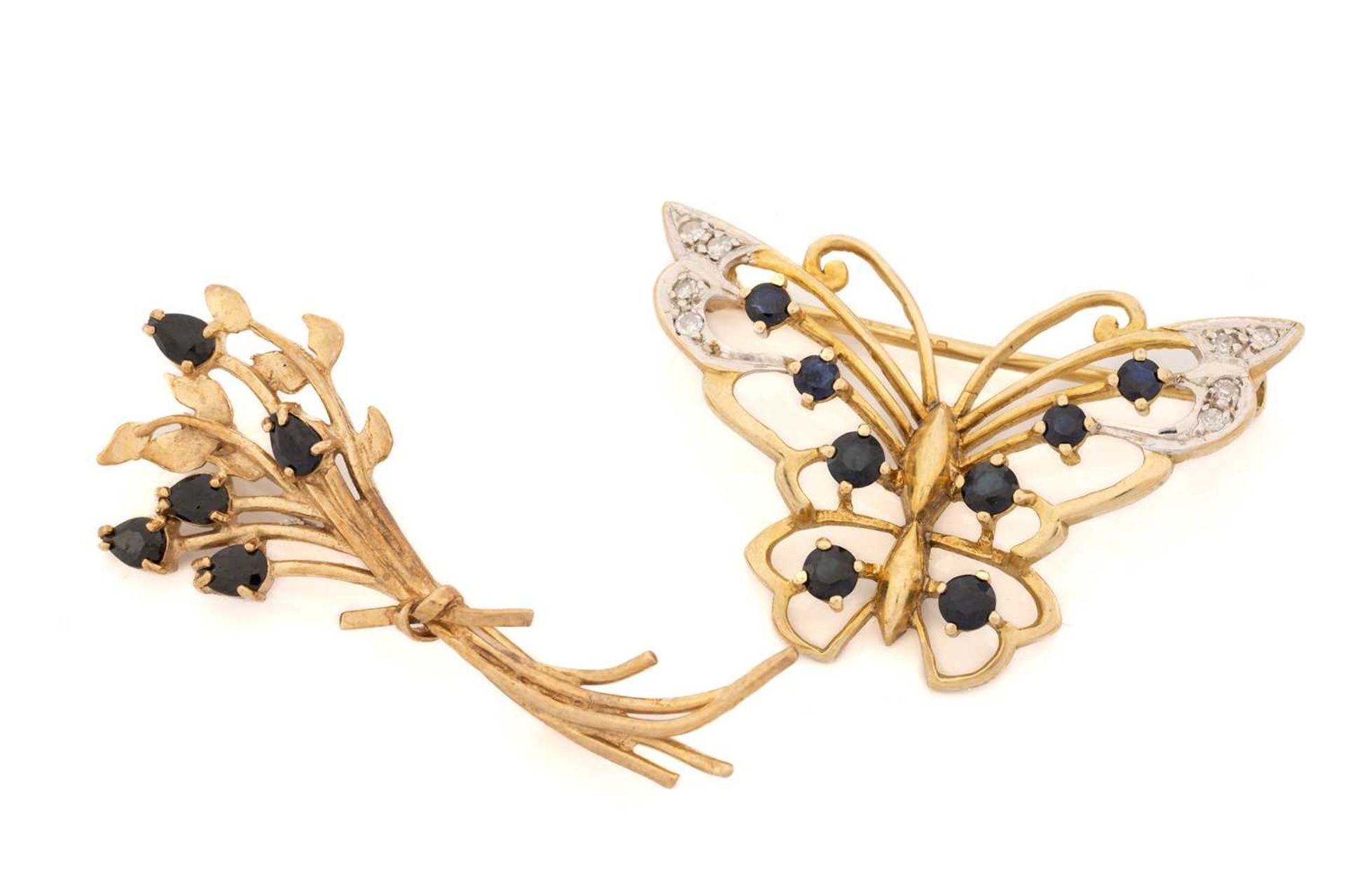 Two 9ct gold brooches comprising a sapphire and diamond set butterfly brooch, 3.5cm wide and another