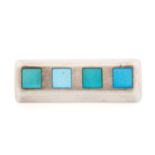 Georg Jensen - an enamel brooch of tapered trapezoidal shape, with four squares of varying modulated