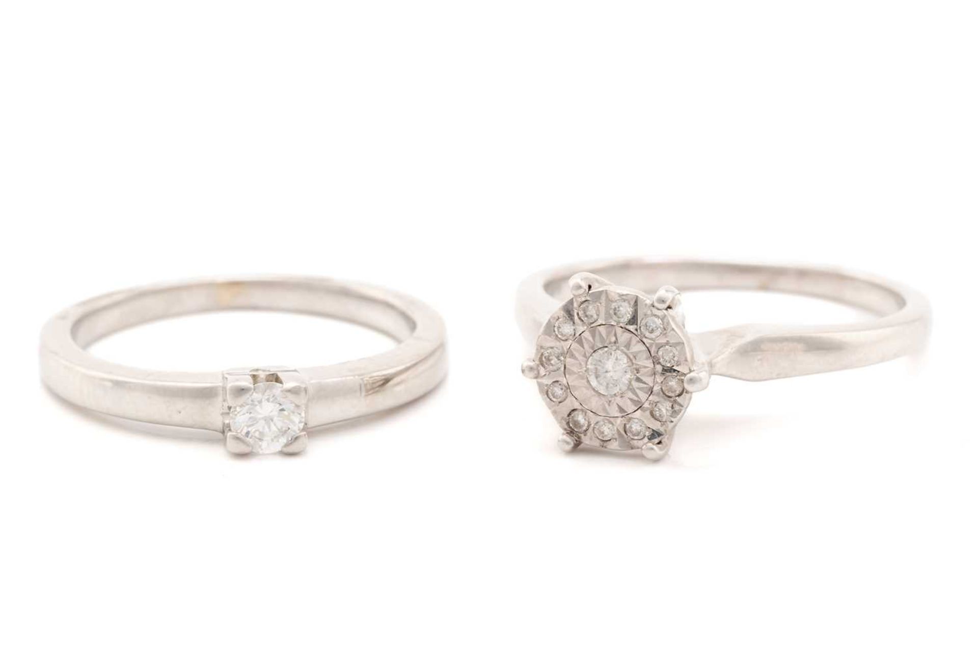 A single stone diamond ring and a diamond cluster ring, featuring a claw set round brilliant cut - Image 5 of 6