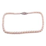 A single strand graduated cultured pearl necklace, 5.5 mm diameter to 9.6 mm with a navette shape