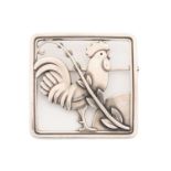Georg Jensen - A cockerel brooch, depicting a cockerel with fern accent in a square frame, with