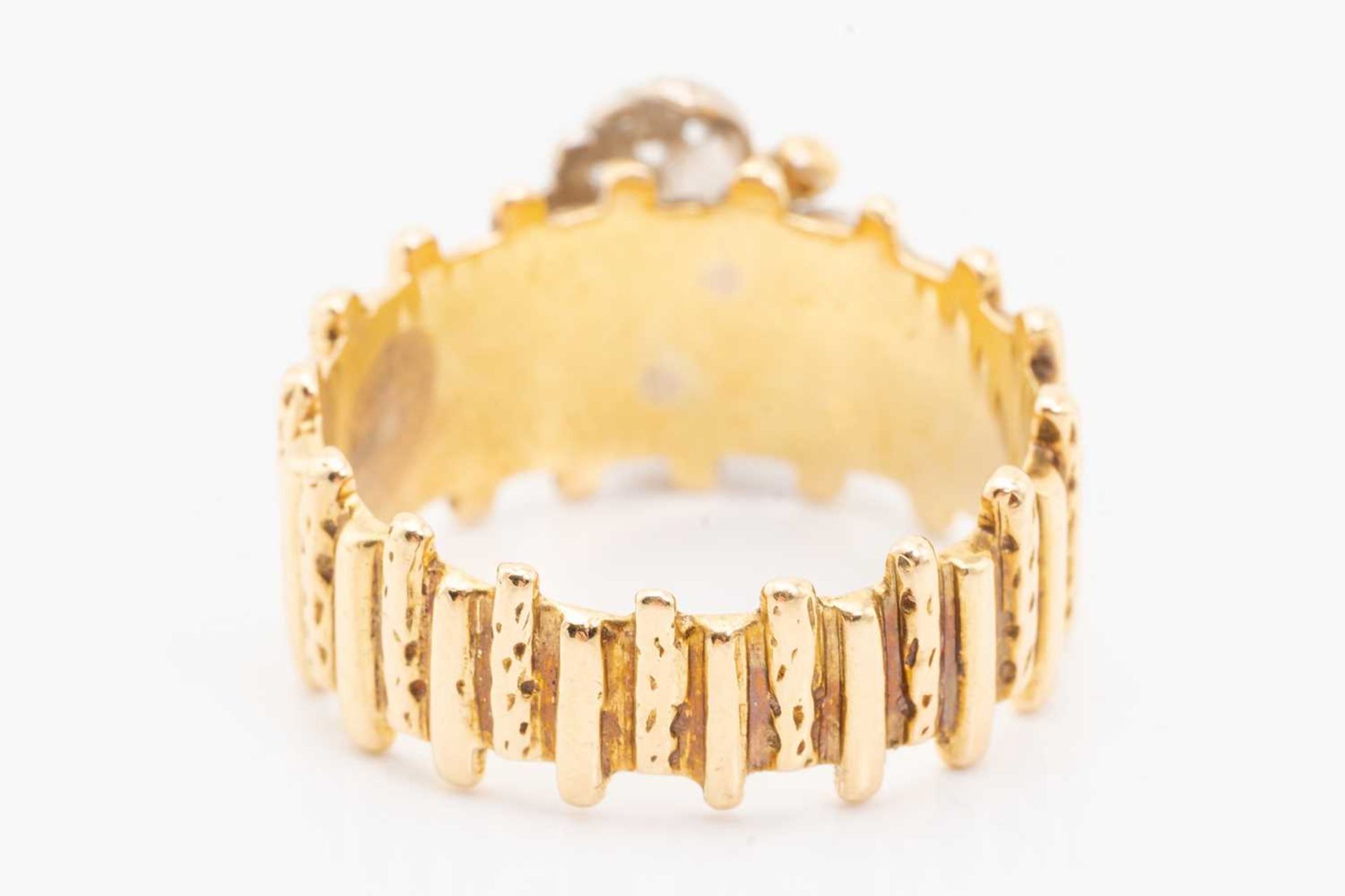 A yellow metal and diamond ring, designed with a diamond-set butterfly, with textured band, unmarked - Image 5 of 5