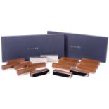 David Linley: two boxed sets of eight English walnut and silver plated rectangular name place stands