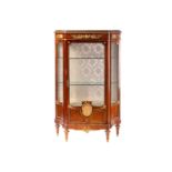 A French Louis XVI style mahogany single door marble topped vitrine, late 19th century, of concave