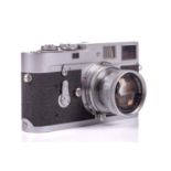 A 1960 Leica M2 Rangefinder camera, chrome, serial no. 989419, with Leitz Elmar Summicron lens, f=