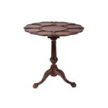 A George III style mahogany revolving supper table, 20th century (but a faithful copy), the circular