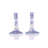 A pair of Meissen porcelain 'Onion' pattern Dutch style squat candlesticks of hexagonal section,
