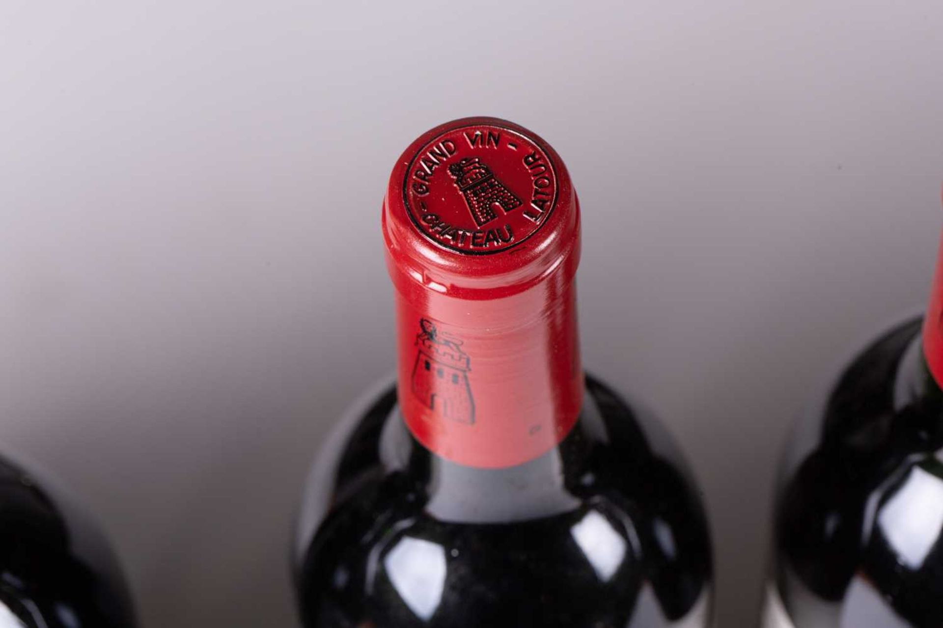 A twelve bottle case of Grand Vin de Chateau Latour, 1988, tissue wrapped bottles, ullage bottom - Image 19 of 21