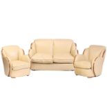 A good quality Art Deco style 'Odeonesque' design ivory hide upholstered Cloud Back three-piece
