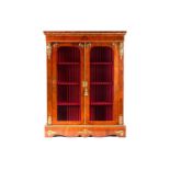 A Victorian French style two door figured walnut vitrine, with satin wood stringing and tulipwood