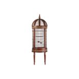 An extremely large and impressive 19th century style cylindrical mahogany parrot cage,late 20th