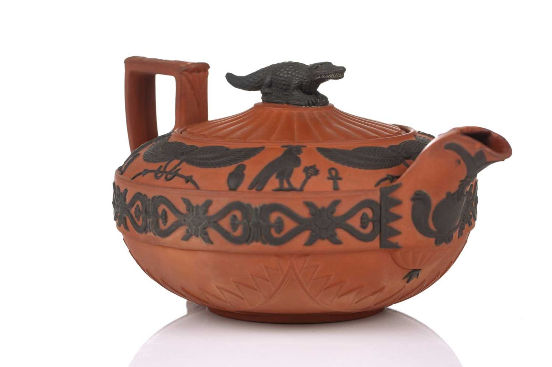 A Wedgwood rosso antico teapot and cover, early 19th century, with applied Egyptian decoration, - Bild 4 aus 21