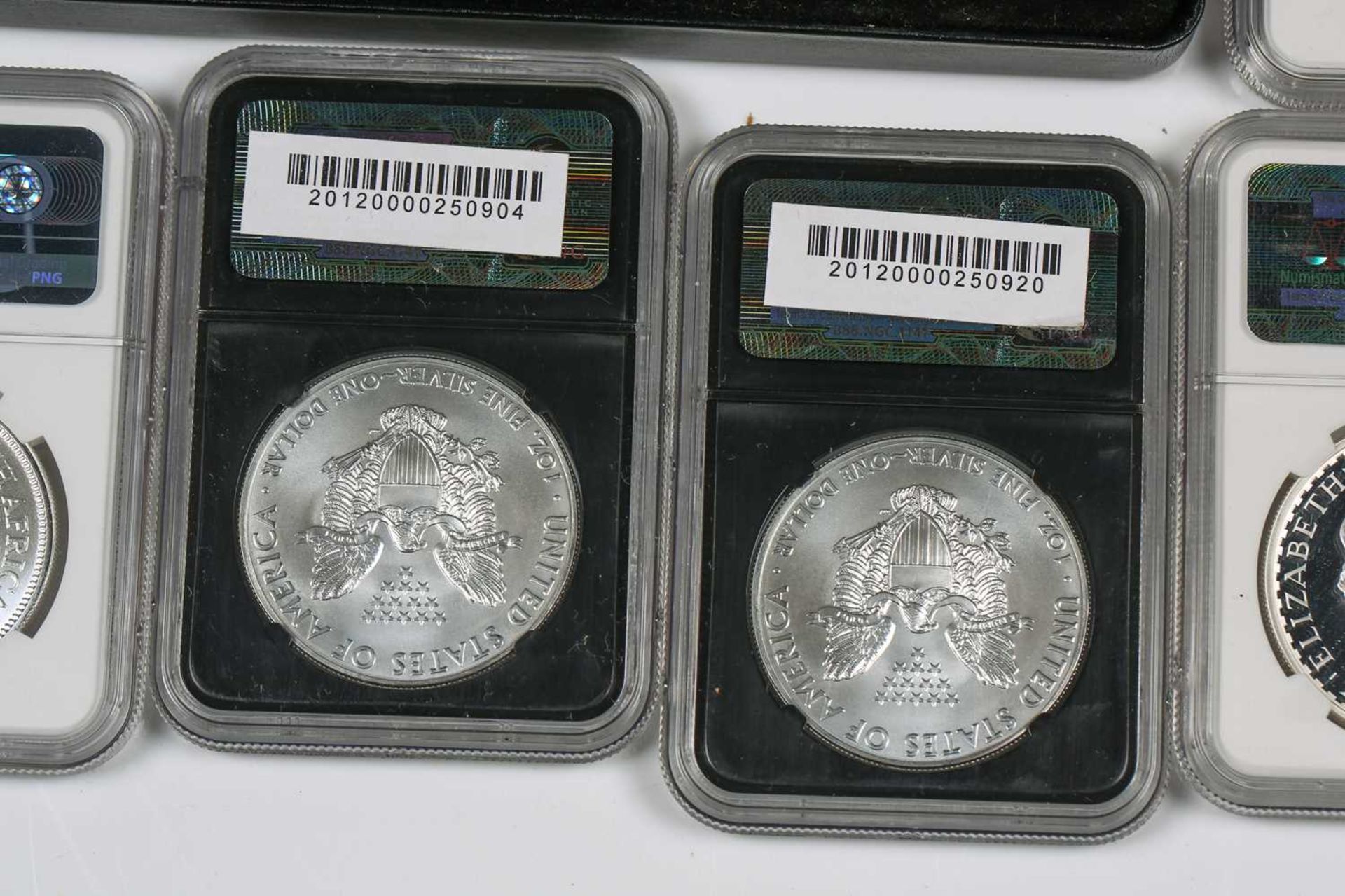 A collection of eleven fine silver proof crown size coins, comprising two coin set Britannia 'The - Image 4 of 14
