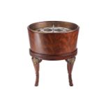 A Theodore Alexander "Rep-Li-Ca" craftsman-made oval mahogany Bachanailian cellarette on stand, 20th