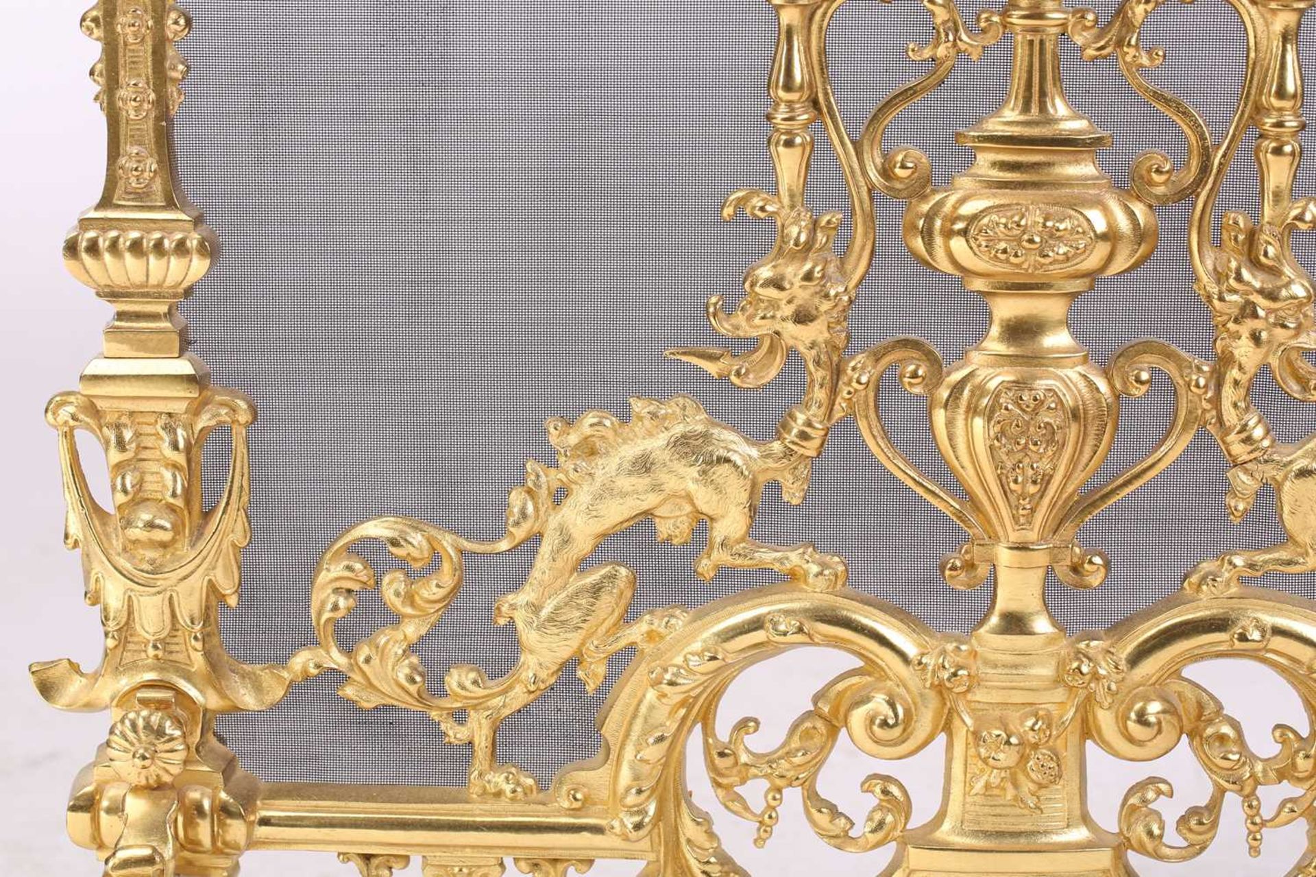 A Louis XVI-style heavy ormolu spark guard, late 20th century, with a shaped arch top above a pieced - Image 6 of 10