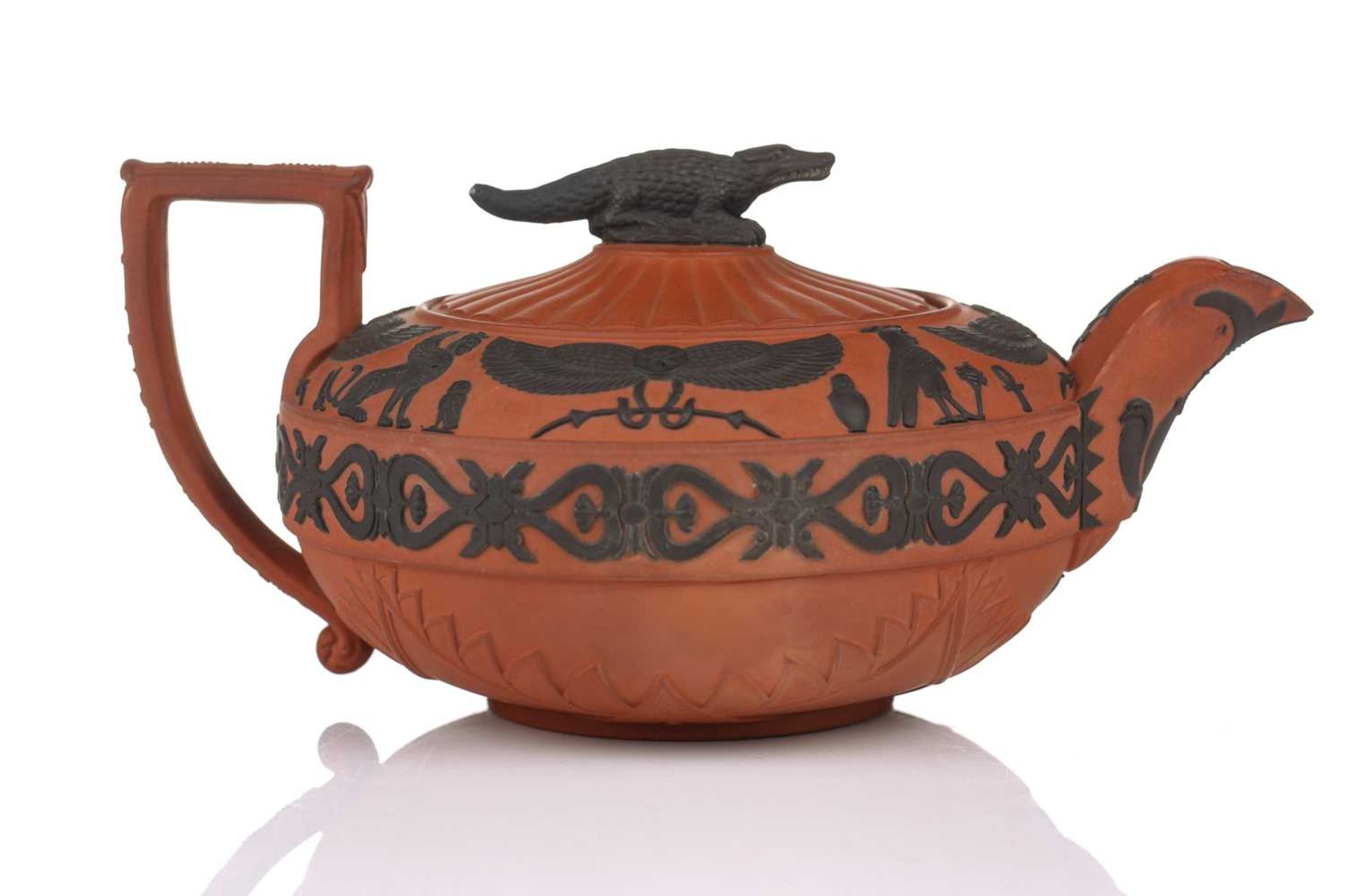 A Wedgwood rosso antico teapot and cover, early 19th century, with applied Egyptian decoration, - Bild 3 aus 21