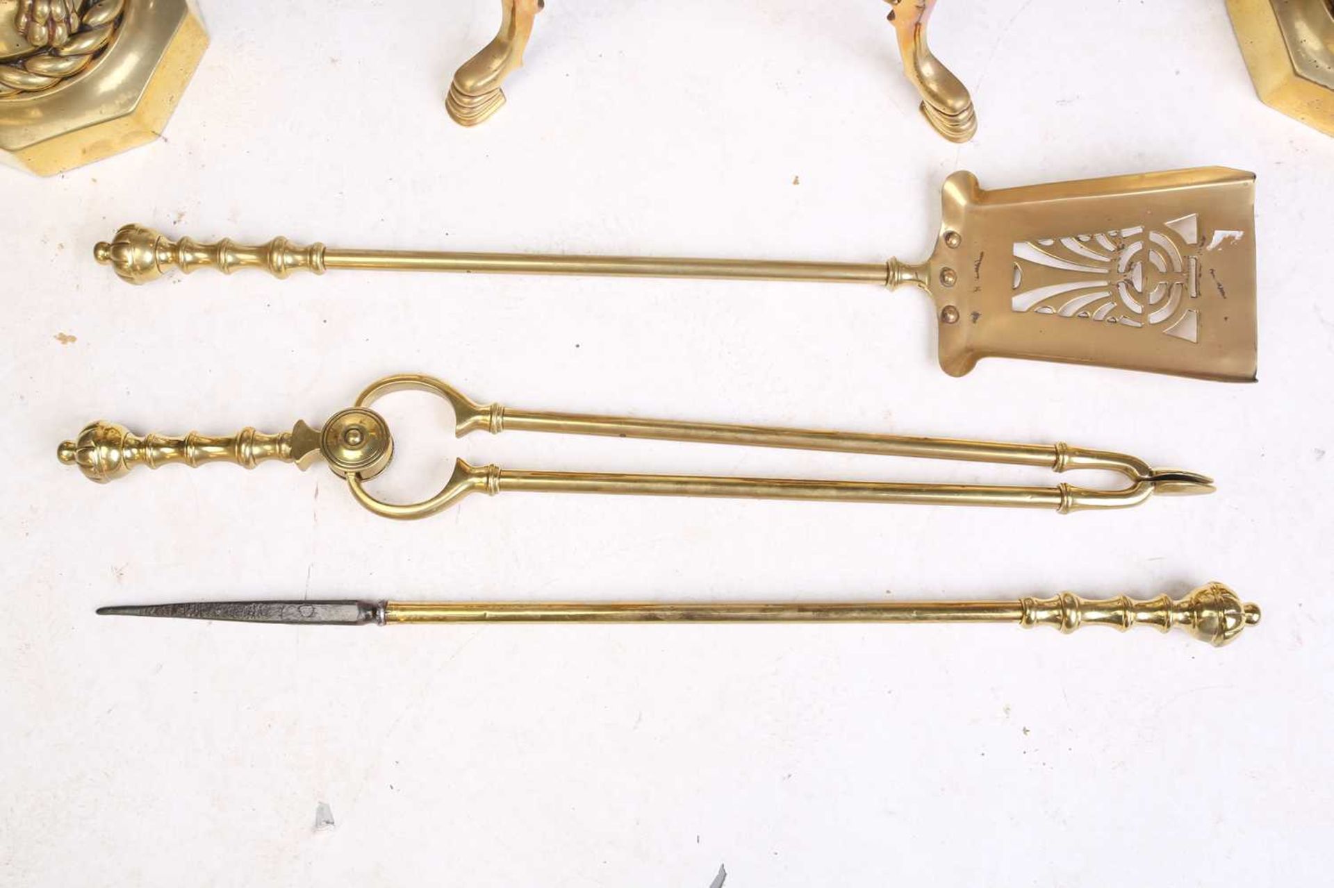 A pair of Victorian cast and gilt brass heraldic sejant erect lion firedogs, each holding a - Bild 7 aus 7