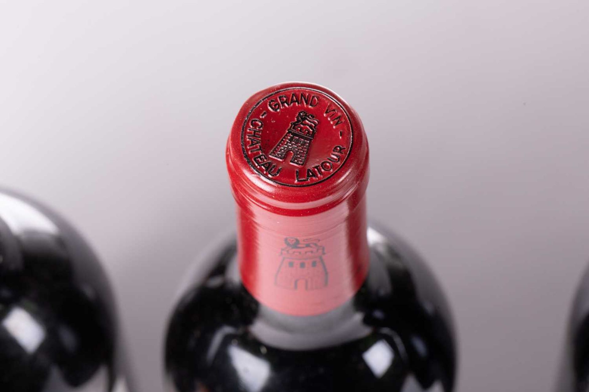 A twelve bottle case of Grand Vin de Chateau Latour, 1988, tissue wrapped bottles, ullage bottom - Image 21 of 21
