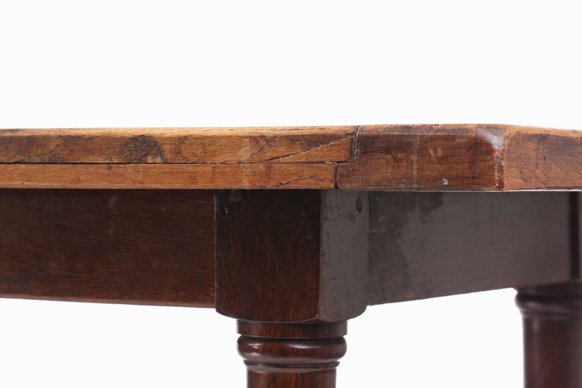 A French rustic oak farmhouse table, 19th century, with cleated scrubbed plank top, supported by - Image 8 of 8