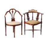 Two Edwardian mahogany corner salon armchairs one with lure splat and one with oval seat, both